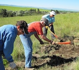 National Trails Day 2011 volunteers who are also adopt-a-trail volunteers clearing a trail in order to re-route a badly eroding trail at Bennington Lake.