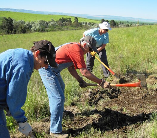 National Trails Day 2011 volunteers who are also adopt-a-trail volunteers clearing a trail in order to re-route a badly eroding trail at Bennington Lake.