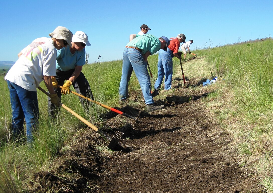 National Trails Day 2011 volunteers clearing a trail in order to re-route a badly eroding trail at Bennington Lake.