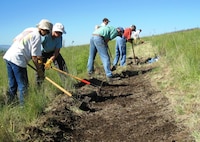 National Trails Day 2011 volunteers clearing a trail in order to re-route a badly eroding trail at Bennington Lake.