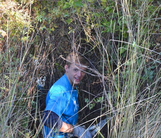 Walla Walla University Community Service Day tree removal on the Mill Creek Levees.  Engineers Without Borders Club member removing unwanted woody vegetation along the Mill Creek Levees.