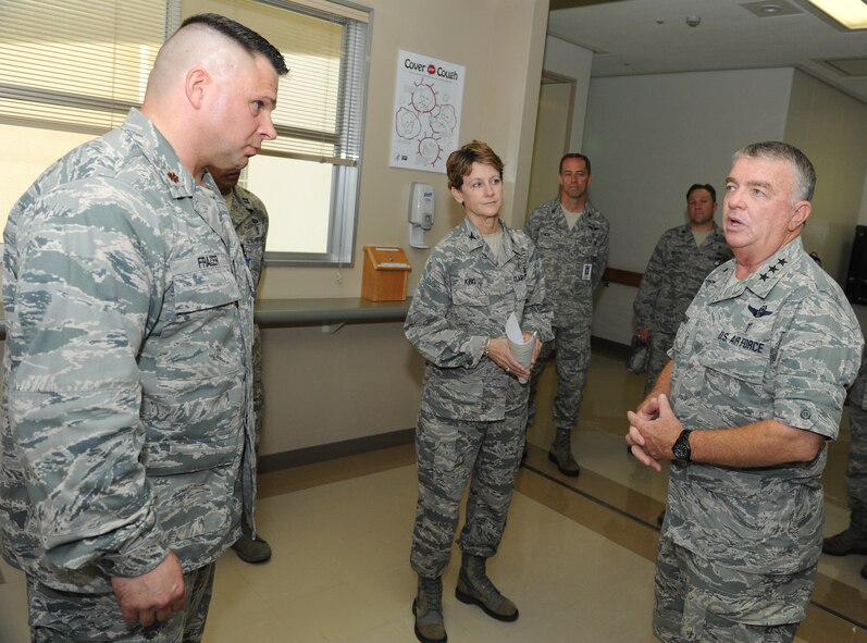 U.S. Air Force Lt. Gen. (Dr.) Thomas Travis, Air Force Surgeon General, Headquarters U.S. Air Force, Washington, D.C., speaks to the Airmen of the 18th Medical Group during his tour of the medical clinic on Kadena Air Base, Japan, July 16, 2013. Travis visited the 18th Wing on his tour throughout the Pacific region to learn more about the mission and to interact with the Airmen and staff. (U.S. Air Force photo by Airman 1st Class Keith A. James/Released)