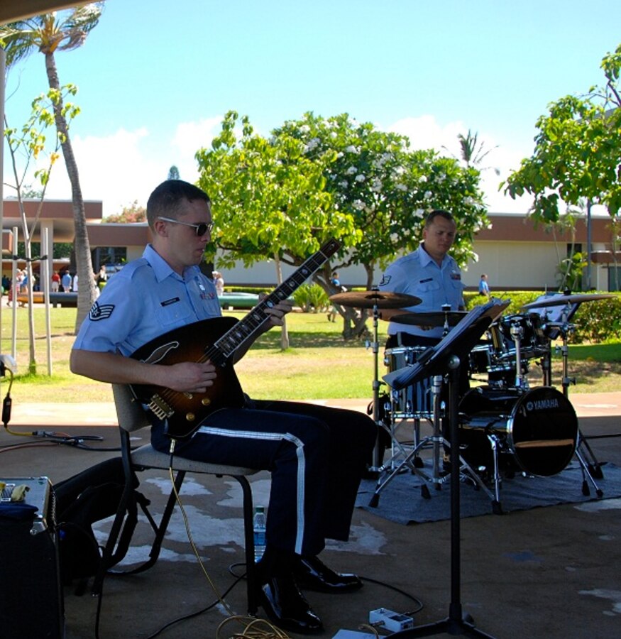 SSgt Jesse Thompson plays a "jazzy" solo on his headless guitar. 