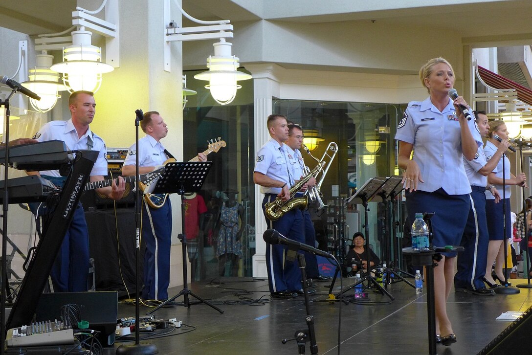 MSgt Murdzia sings to an excited and patriotic crowd on the 3rd of July at Aloha Tower in downtown Honolulu, HI. 