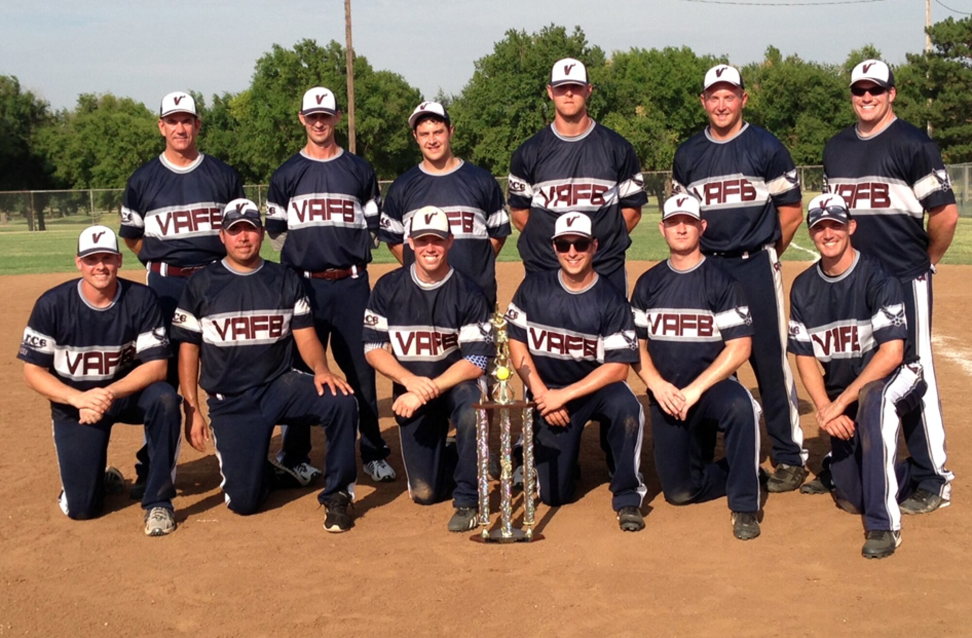 The Vance Varsity Slow Pitch Softball team swept the Oklahoma Northwest District Amateur Softball Association tournament this past weekend in Enid. Playing in the tournament were: front row from left, John Stock, Adam Hinojosa, John Powers, Eric Klender, Jon Birmingham, Patrick Mayfield; back row from left, Mike Rich, Brendan Voitik, Dan Bellissimo, Matt Leicester, Matt Simpson and Curtis Holtman. (Courtesy photo)