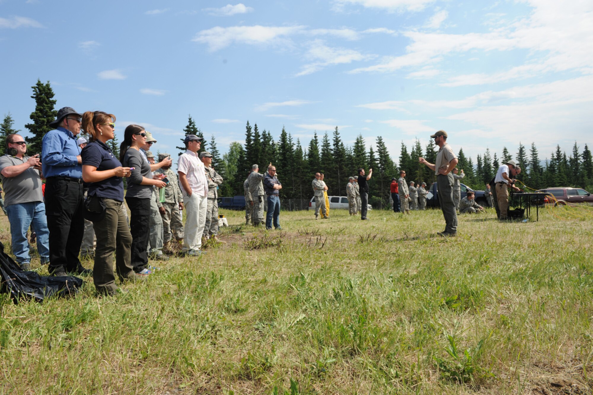 JOINT BASE ELMENDORF-RICHARDSON, Alaska -- Derek Espelend, special agent bomb technician of the FBI Anchorage Division, teaches military explosive ordinance technicians and local first responders about the types of chemicals used to create explosives encountered by public safety and law enforcement personnel,  June 28.  The demonstration was part of Chemical Industry Outreach Workshop under the National Improvised Explosive Familiarization training program. (U.S. Air Force Photo/Airman 1st Class Omari Bernard)