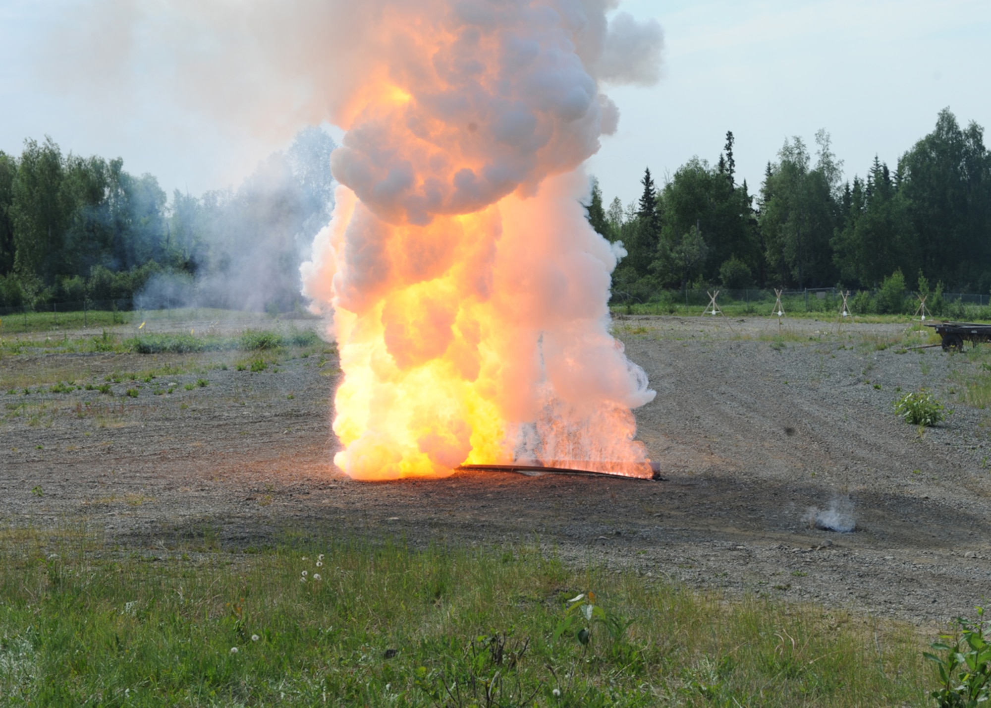 JOINT BASE ELMENDORF-RICHARDSON, Alaska -- The Anchorage division of the FBI hosted an improvised explosives demonstration, June 28.  The demonstration was part of Chemical Industry Outreach Workshop under the National Improvised Explosive Familiarization training program. (U.S. Air Force Photo/Airman 1st Class Omari Bernard)