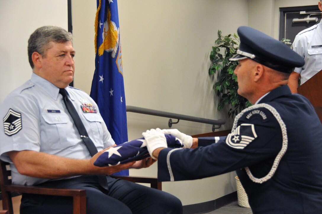 TRAVIS AIR FORCE BASE, Calif. -- Senior Master Sgt. Peter V. Briggs has a retirement ceremony July 14, 2013 at Travis Air Force Base, Calif.  (U.S. Air Force photo / Senior Airman Amelia Leonard)