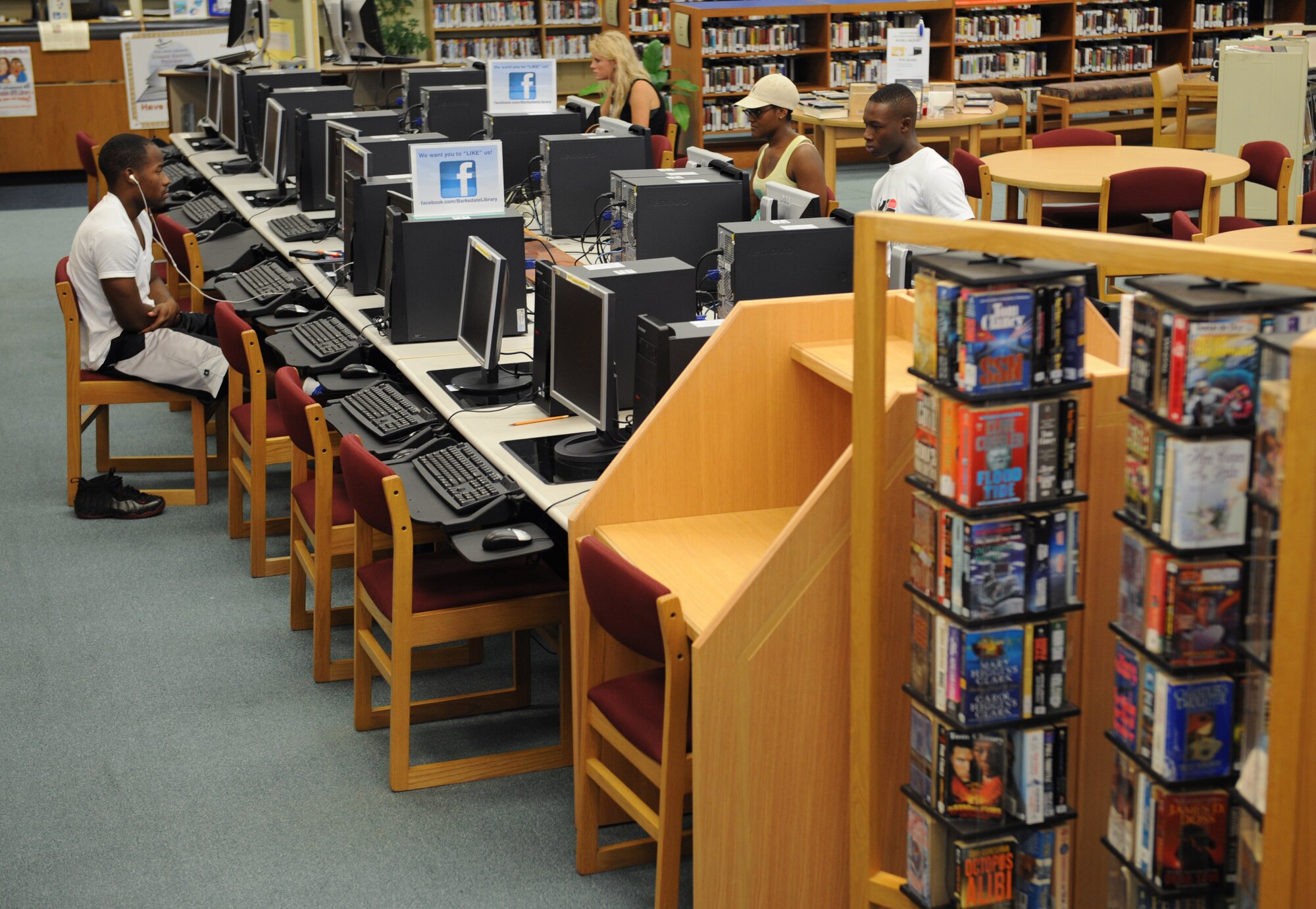 Team Barksdale personnel study at the library on Barksdale Air Force Base, La., July 17, 2013. The library provides Team Barksdale access to computers and audio books. (U.S. Air Force photo/Airman 1st Class Benjamin Gonsier)
