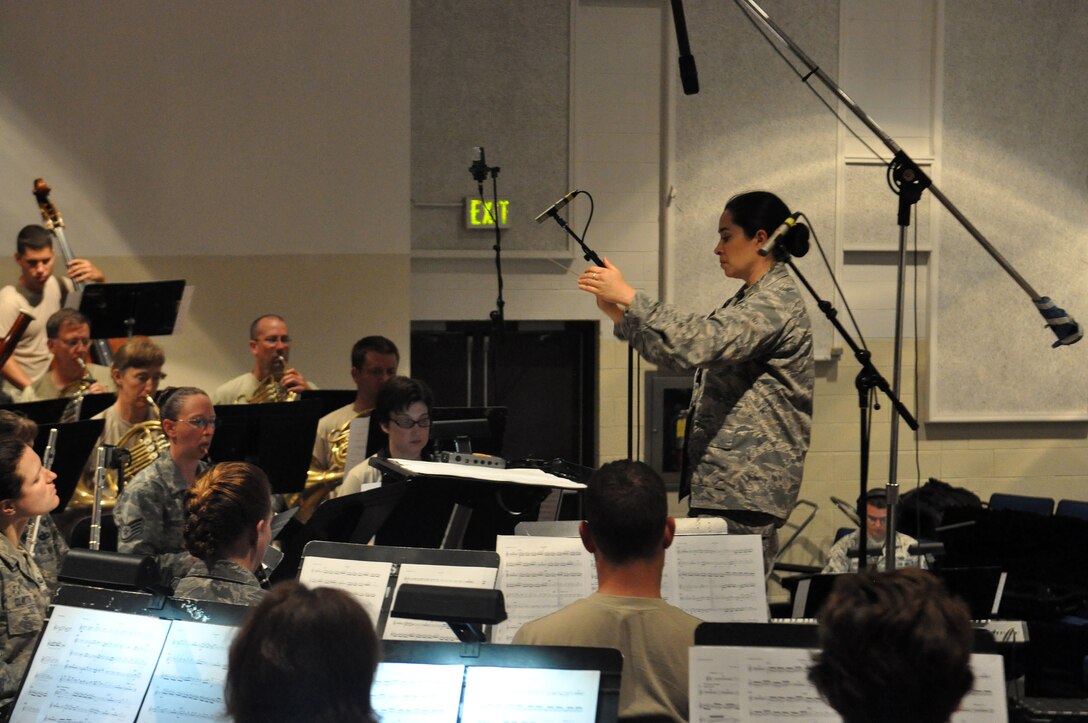 The U.S. Air Force Band of Mid America records a new song for the "10th Anniversary Rebirth of the 18th Air Force" July 10 in the Library Auditorium. The 18th Air Force collaborated with the band to produce a matching video for the song, called Expedite. (U.S. Air Force Photo/ Airman 1st Class Joshua Eikren)