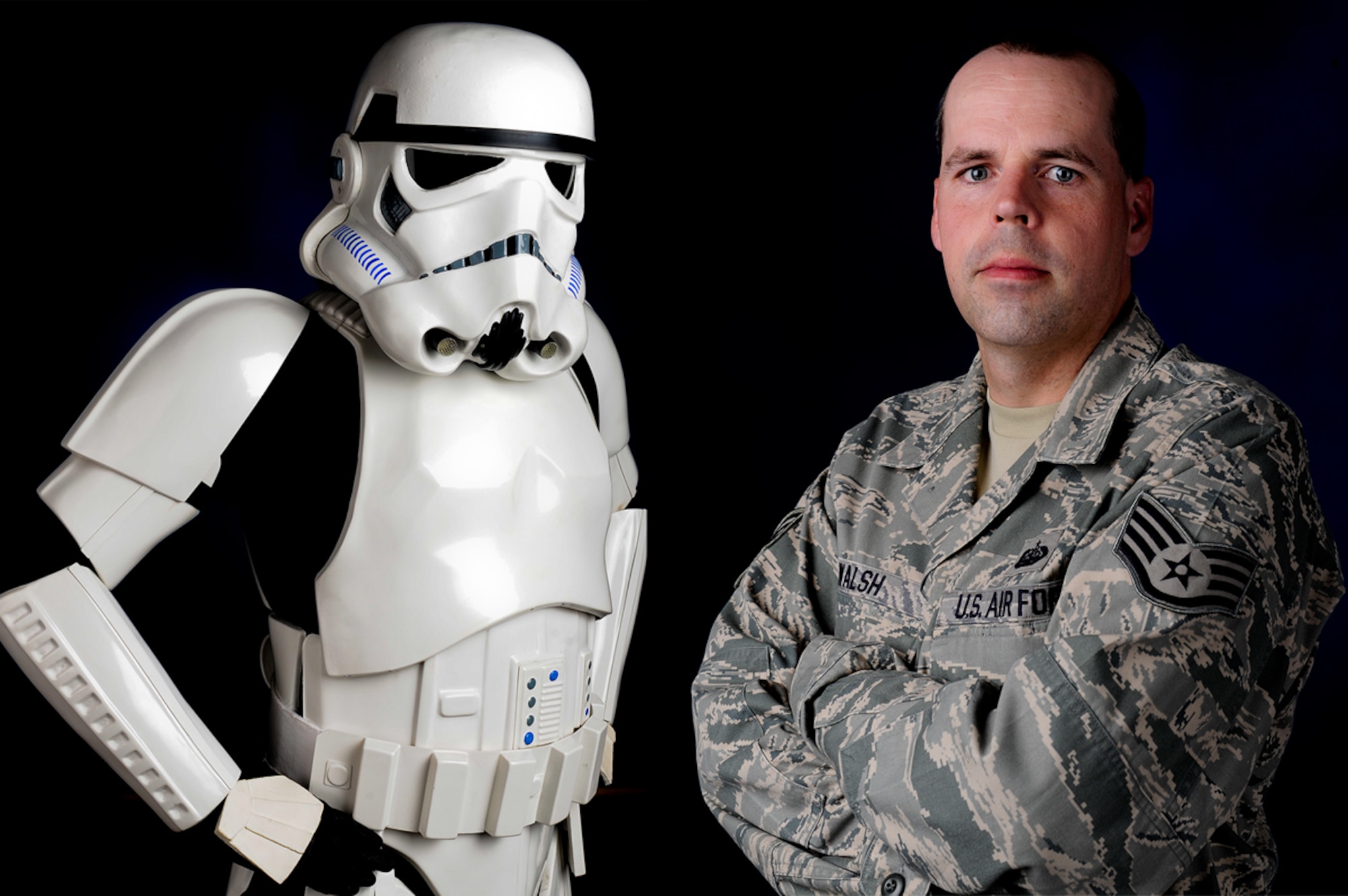 Air Force Staff Sgt. Patrick Walsh, 673d Communications Squadron cyber transport supervisor, poses as a Stormtrooper and in his Air Force uniform June 26, 2013. Walsh is a member of the 501st, which is an all volunteer organization that makes movie accurate costumes and wears them to promote interest in Star Wars, encourage use of the costumes made, and to contribute to the local community. (U.S. Air Force illustration/Staff Sgt. Zachary Wolf)