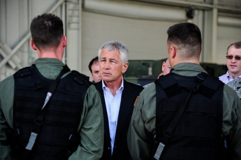 Secretary of Defense Chuck Hagel speaks to Phoenix Ravens during the 628th Security Forces Squadron’s presentation during Joint Base Charleston’s – Air Base’s “Air Force showcase” July 17, 2013 at JB Charleston – Air Base, S.C. Hagel’s visit to JB Charleston included learning about flying and support operations conducted in the Air Force at Charleston, meeting with Boeing representatives to talk about what the company provides to the Air Force, and conducting a town hall meeting with Department of Defense civilian employees to discuss federal government sequestrations and civilian work furloughs in the department. (U.S. Air Force photo/Staff Sgt. Rasheen Douglas)