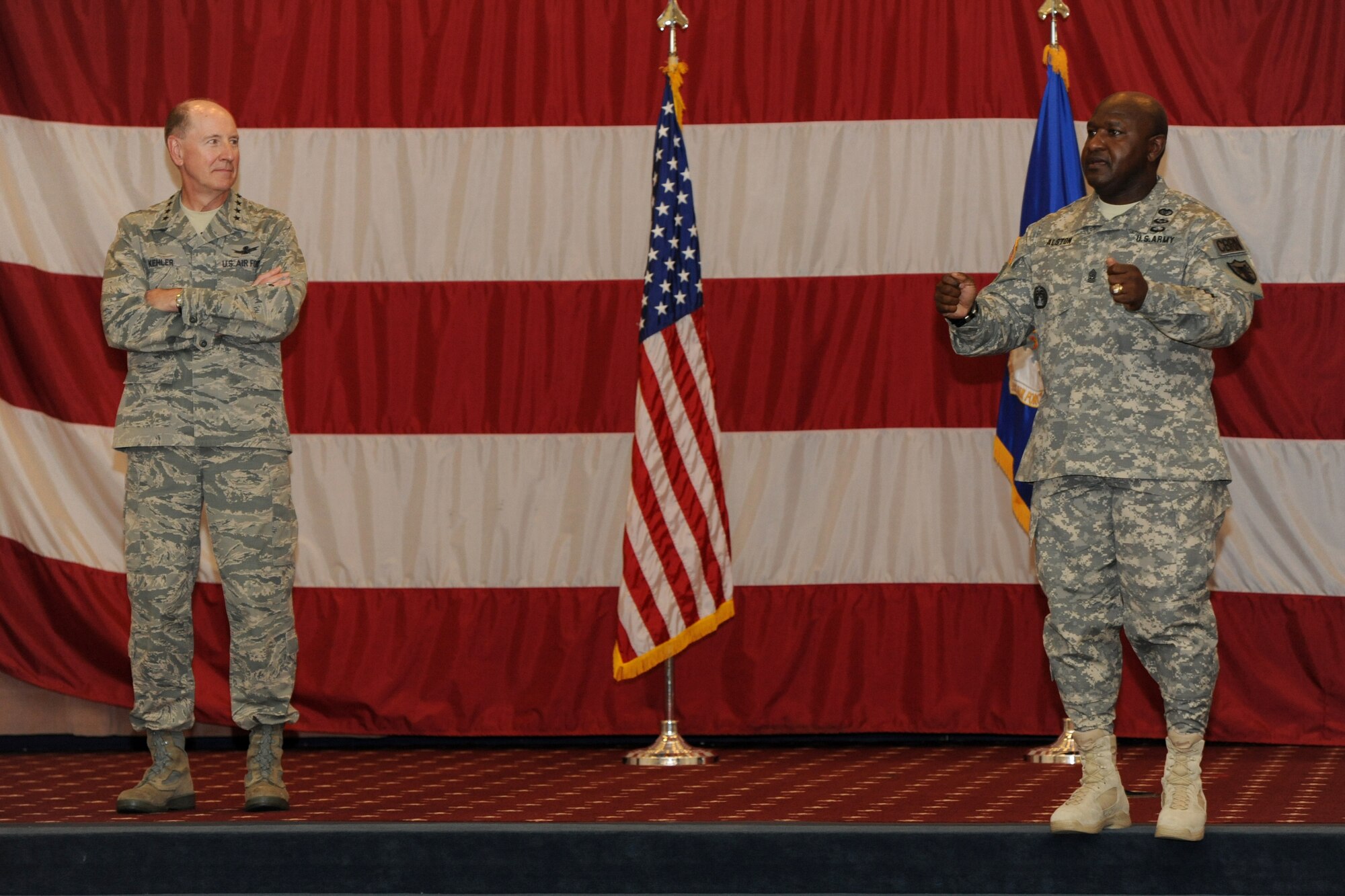 Command Sgt. Maj. Patrick Z. Alston, U.S. Strategic Command senior enlisted leader, addresses Airmen of Air Force Global Strike Command during an All Call at Barksdale Air Force Base, La., July 16. Gen. C. Robert Kehler, U.S. STRATCOM Commander, and Alston spoke on the mission and future of AFGSC. (U.S. Air Force photo/Airman 1st Class Jannelle Dickey)