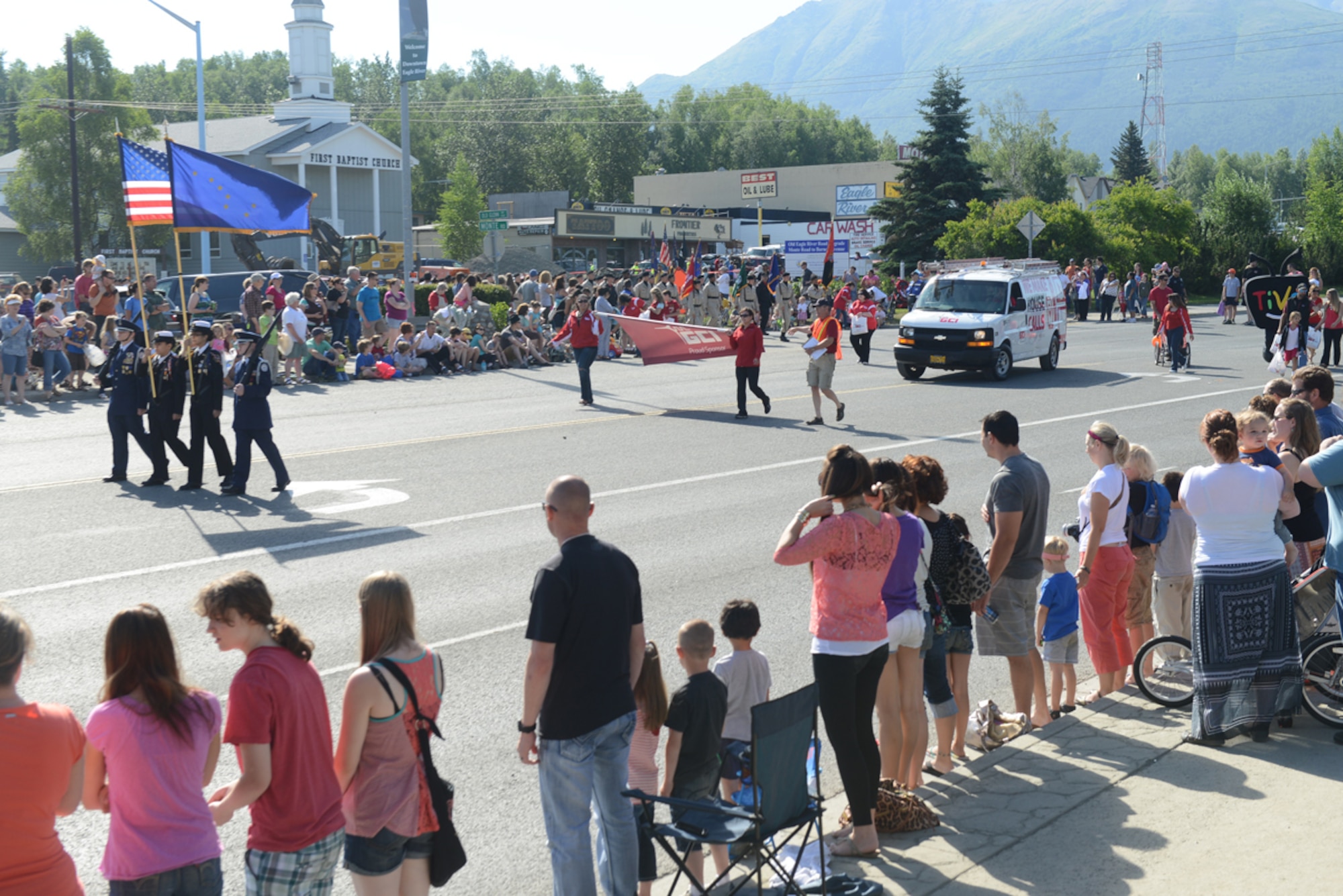 JOINT BASE ELMENDORF-RICHARDSON, Alaska - Thousands of spectators line the streets to watch the 28th annual Bear Paw Parade in Eagle River, Alaska, July 13. The parade is a part of the five-day Bear Paw Festival, which is hosted every year by the Chugiak-Eagle River Chamber of Commerce. Joint Base Elmendorf-Richardson's 673d Security Forces Squadron and Joint Base Against Drunk Driving program members were featured in the parade. (U.S. Air Force photo/Airman Ty-Rico Lea)
