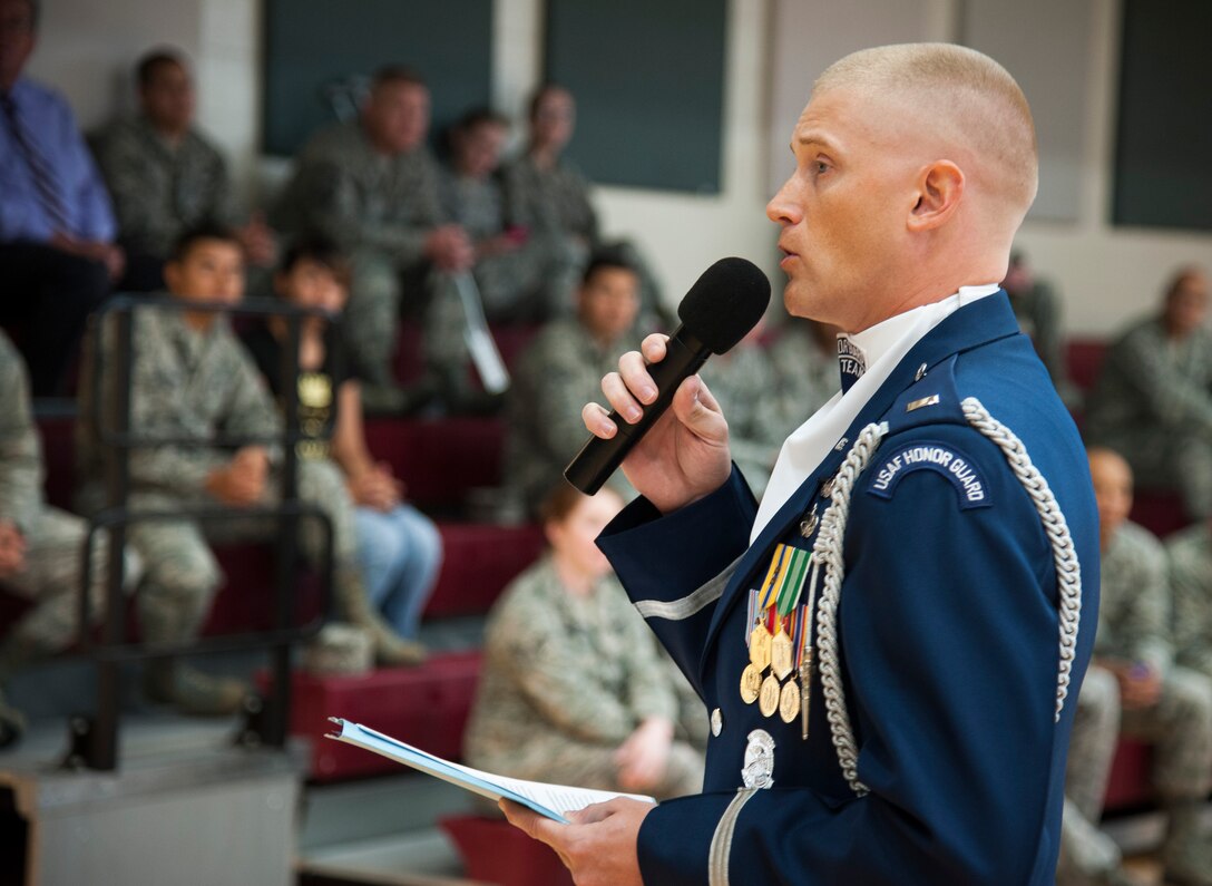 First Lt. Michael Lemorie, U.S. Air Force Honor Guard drill team commander, speaks with Team XL members at Laughlin Air Force Base, Texas, July 16, 2013. The drill team recently performed at Laughlin to display their skills and to recruit other members into their ranks. (U.S. Air Force photo/Senior Airman John D. Partlow)