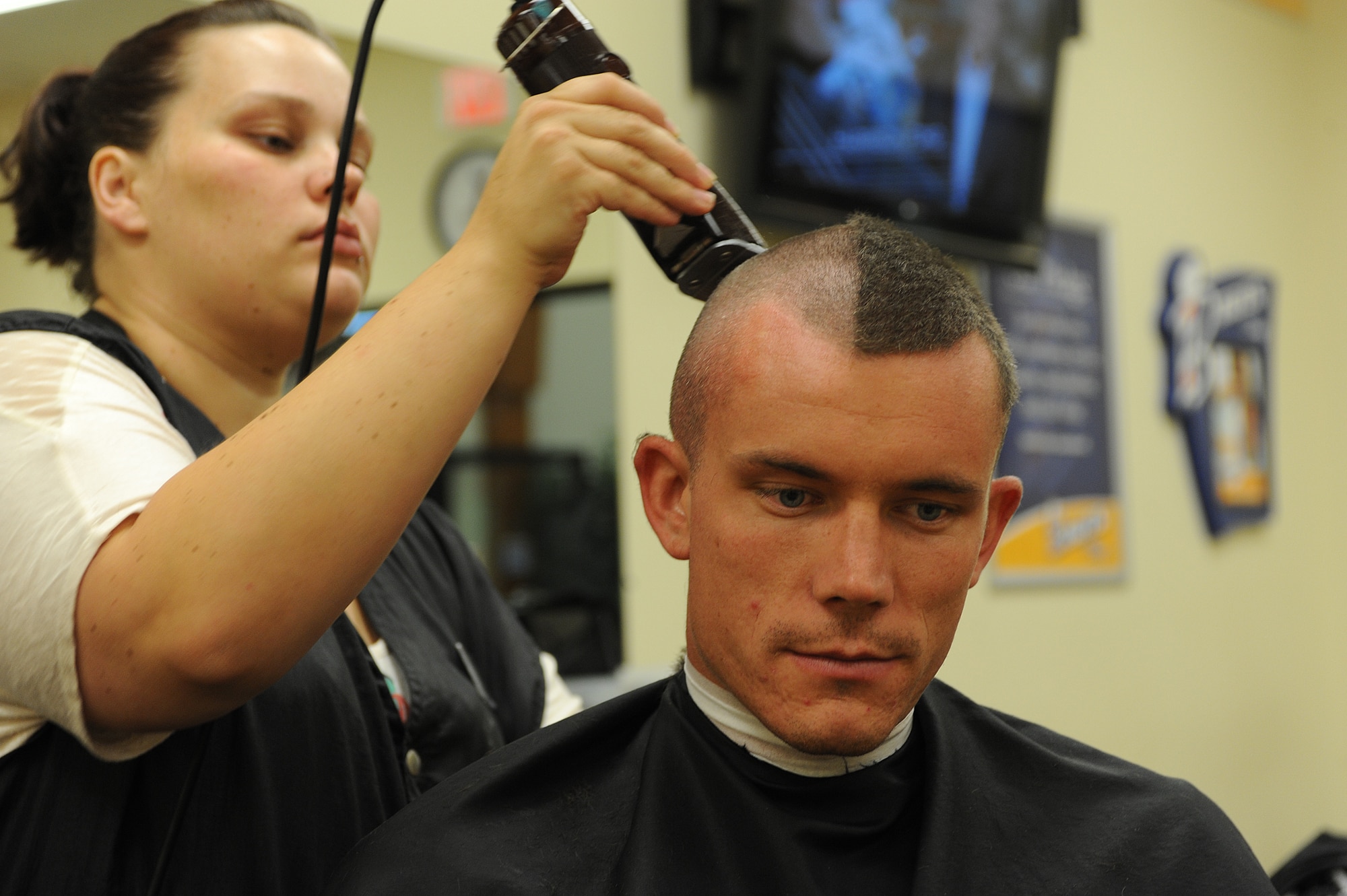 The Minot Air Force Base Barber Shop has been in business for more than thirty years, offering Airmen a cost effective means of keeping themselves well groomed and up to Air Force standards. The shop is open Monday through Friday from 10 a.m. to 6 p.m. Grooming standards are an important part of ensuring that military members promote a positive and professional image of the Air Force to the rest of the military and civilian community. (U.S. Air Force photo/ Airman 1st Class Stephanie Ashley)
