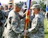 From left, U.S. Army Col. Julius Rigole, incoming 128th Aviation Brigade commander, accepts the unit guidon from U.S. Army Maj. Gen. Kevin Mangum, U.S. Army Aviation Center of Excellence commanding general, as he assumes command during the unit's change of command ceremony at Fort Eustis, Va., July 17, 2013. Rigole assumed command of the unit from U.S. Army Col. Dean Heitkamp. (U.S. Air Force photo by Staff Sgt. Wesley Farnsworth/Released)