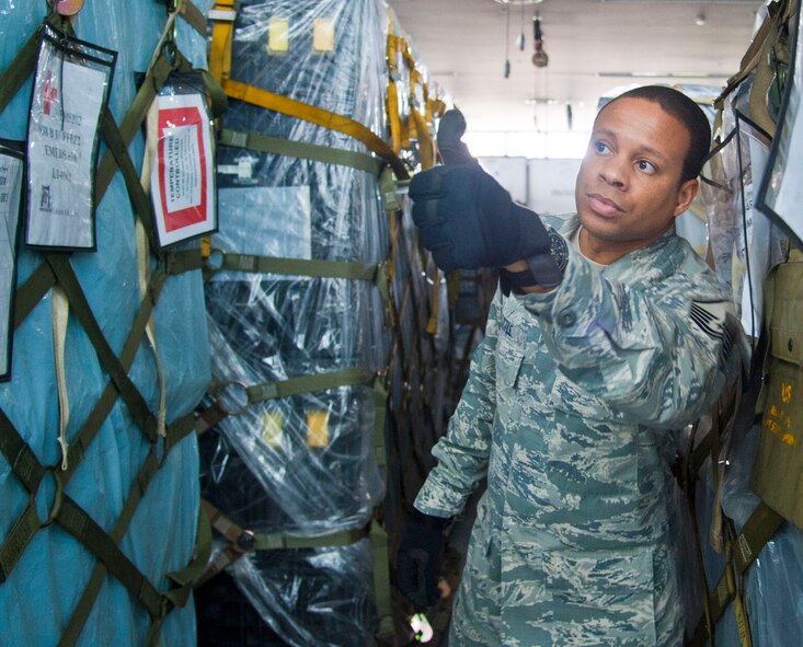 YOKOTA AIR BASE, Japan – Master Sgt. Robert Little, the non-commissioned officer in chargeof medical materiel, 374 Medical Group, gives the guidance to the forklift driver at Yokota Air Base, Japan, July 16, 2013.  The 374 MDG tested the wing’s capability to deploy medical assets for humanitarian missions.  (U.S. Air Force photo by Airman 1st Class Soo C. Kim)
