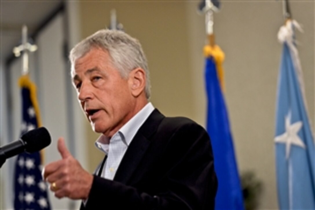 Defense Secretary Chuck Hagel holds a town hall meeting with civilian employees and service members during a visit to Joint Base Charleston, S.C., July 17, 2013. 