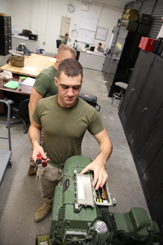 Lance Cpl. Gabriel Ablel, 1st Battalion, 6th Marine Regiment, 22nd Marine Expeditionary Unit optics technician and native of Rutherfordton, N.C., inspects and performs a functions check on an M41 Saber missile system at the unit’s armory at Marine Corps Base Camp Lejeune, July 15, 2013, in preparation for the unit’s upcoming deployment. The Saber system uses an optically-tracked and wire-guided anti-tank missile. (Marine Corps photo by Cpl. Manuel A. Estrada/Released)
