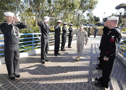 A formation of Sailors, assigned to Commander, U.S. Third Fleet, render honors to Commander, NORAD and USNORTHCOM, Army Gen. Charles Jacoby, during a visit to Third Fleet headquarters in San Diego. Jacoby met with Commander, U.S. Third Fleet, Vice Adm. Gerald R. Beaman for a routine visit. U.S. Third Fleet leads naval forces in the eastern Pacific from the west coast of North America to the International Date Line. 
