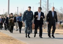 Navy Adm. James Winnefeld, North American Aerospace Defense Command and U.S. Northern Command commander, escorts members of the Canadian Embassy and consulates to NORAD and USNORTHCOM headquarters at the beginning of a visit to the commands Feb. 15. The purpose of the visit was to educate the members of the Canadian Consulate Heads of Mission about the missions of NORAD as well as those assumed by USNORTHCOM after the Sept. 11, 2001, attacks in connection with homeland defense. More than 20 Embassy and consulate staff members received briefings on the NORAD and USNORTHCOM missions and tours of the NORAD and USNORTHCOM Command Center and Cheyenne Mountain Air Force Station. 