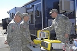Members of NORAD and USNORTHCOM take a look at the latest innovations in Chemical, Biological, Radiological and Nuclear response equipment at the NORAD and USNORTHCOM CBRN Summit March 13, 2012. The purpose of this year’s summit is to bring together Canadian and U.S. CBRN personnel from local, state, national and military organizations to give the current composition of the CBRN Response Enterprise a hard look and determine if changes need to be made. 
