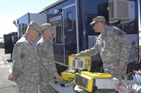 Members of NORAD and USNORTHCOM take a look at the latest innovations in Chemical, Biological, Radiological and Nuclear response equipment at the NORAD and USNORTHCOM CBRN Summit March 13, 2012. The purpose of this year’s summit is to bring together Canadian and U.S. CBRN personnel from local, state, national and military organizations to give the current composition of the CBRN Response Enterprise a hard look and determine if changes need to be made. 
