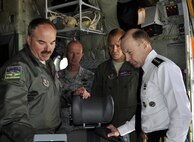 Army Gen. Charles H. Jacoby, Jr. commander of NORAD and U.S. Northern Command gets a first-hand view of a U.S. Forest Service-owned Modular Airborne Fire Fighting System II on board a 302nd Airlift Wing C-130 April 20. From left to right; Air Force Reserve MAFFS qualified loadmasters Master Sgts. Mark Skarban, Thomas Freeman and Lamont Wood give Jacoby a brief overview of how the system operates. The U.S. Forest Service and the 302nd AW held their annual air tanker certification training April 20 through 23 at Peterson Air Force Base and Pueblo Air Tanker Base, Colo. The U.S. Forest Service-led training was designed to ensure the Air Force Reserve MAFFS crews are ready for the upcoming 2012 firefighting season and included 12 hours of ground training and 35 C-130 training missions in southern Colorado. Air Force Reserve MAFFS-equipped C-130s can be requested by the National Interagency Fire Center and then activated through the U.S. Northern Command, based on an agreement with the Department of Defense. 
