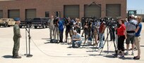 Air Force Lt. Col. Dave Condit, 302nd Airlift Wing, briefs reporters on the Modular Airborne Firefighting System during a media event June 25. Four MAFFS-equpped aircraft from the 302nd Airlift Wing and the 153rd Airlift Wing have been assigned to support wildland fire fighting efforts in Colorado. 

