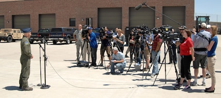 Air Force Lt. Col. Dave Condit, 302nd Airlift Wing, briefs reporters on the Modular Airborne Firefighting System during a media event June 25. Four MAFFS-equpped aircraft from the 302nd Airlift Wing and the 153rd Airlift Wing have been assigned to support wildland fire fighting efforts in Colorado. 
