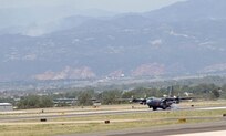 A MAFFS-equipped C-130 from the 153rd Airlift Wing of the Wyoming Air National Guard arrives at Peterson Air Force Base, Colo., June 25, to support wildfire fighting efforts in Colorado. The 153rd AW sent two aircraft equipped with Modular Airborne Fire Fighting Systems to join two from the 302nd Airlift Wing based at Peterson AFB for the effort. 
