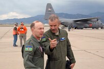Army Gen. Charles H. Jacoby, Jr., NORAD and U.S. Northern Command commander, conducts a tour of MAFFS operations with Air Force Lt. Col. Luke Thompson, 302nd Airlift Wing Chief of Airborne Firefighting, on Peterson Air Force Base, Colo., June 28. Four MAFFS units from the 302nd and 153rd Airlift Wings are currently supporting wildland fire fighting operations in Colorado. 
