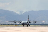 A MAFFS-equipped C-130 from the 146th Airlift Wing of the California Air National Guard arrives at Peterson Air Force Base, Colo., June 30, to support wildland fire fighting operations in the western United States. Four MAFFS units are scheduled to arrive June 30, joining four already operating out of Peterson AFB. The eight MAFFS constitute the entire U.S. military MAFFS fleet. The four units supporting the fire fighting effort are the 302nd Airlift Wing from Peterson AFB, the 146th Airlift Wing from Channel Islands, Calif., the 153rd Airlift Wing from Cheyenne, Wyo., and the 145th Airlift Wing from Charlotte, N.C. 
