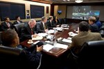 President Barack Obama receives an update on the ongoing response to Hurricane Sandy, in the Situation Room of the White House, Oct. 29 2012. Participating via teleconference, clockwise from top left, are: Secretary of Homeland Security Janet Napolitano; FEMA Administrator Craig Fugate; Rick Knabb, Director of the National Hurricane Center; Secretary of Transportation Ray LaHood; and Secretary of Energy Steven Chu. Pictured, from left, are: Clark Stevens, Assistant Press Secretary; Emmett Beliveau, Director of the Office of the Chief of Staff; John Brennan, Assistant to the President for Homeland Security and Counterterrorism; Richard Reed, Deputy Assistant to the President for Homeland Security; Chuck Donnell, Senior Director for Resilience; Asha Tribble, Senior Director for Response; Chief of Staff Jack Lew; Alyssa Mastromonaco, Deputy Chief of Staff for Operations; Press Secretary Jay Carney; and David Agnew, Director for Intergovernmental Affairs. 
