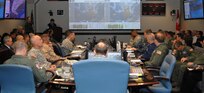Army Gen. Charles H. Jacoby, Jr., NORAD and USNORTHCOM commander, and his staff, receive an update on weather conditions in the areas affected by Hurricane Sandy during a commander’s assessment meeting Oct. 30. U.S. Northern Command is poised to provide Department of Defense support to FEMA, tribal, state and local response efforts due to the hurricane. Part of the USNORTHCOM Defense Support of Civil Authorities (DSCA) mission directs the command to plan and anticipate actions that it may need to take to support civil authorities. USNORTHCOM plays an important role in disaster response; however, all efforts are in support of a lead federal agency working closely with state and local officials. 
