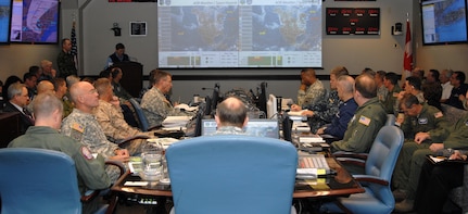 Army Gen. Charles H. Jacoby, Jr., NORAD and USNORTHCOM commander, and his staff, receive an update on weather conditions in the areas affected by Hurricane Sandy during a commander’s assessment meeting Oct. 30. U.S. Northern Command is poised to provide Department of Defense support to FEMA, tribal, state and local response efforts due to the hurricane. Part of the USNORTHCOM Defense Support of Civil Authorities (DSCA) mission directs the command to plan and anticipate actions that it may need to take to support civil authorities. USNORTHCOM plays an important role in disaster response; however, all efforts are in support of a lead federal agency working closely with state and local officials. 
