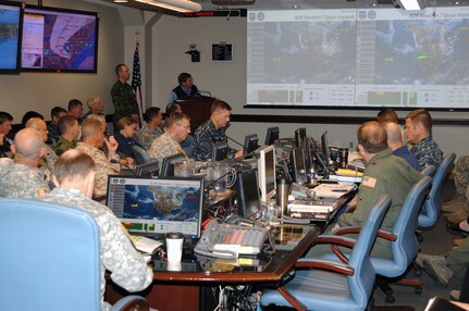 Army Gen. Charles H. Jacoby, Jr., NORAD and USNORTHCOM commander, and his staff, receive an update on weather conditions in the areas affected by Hurricane Sandy during a commander’s assessment meeting Oct. 30. U.S. Northern Command is poised to provide Department of Defense support to FEMA, tribal, state and local response efforts due to the hurricane. Part of the USNORTHCOM Defense Support of Civil Authorities (DSCA) mission directs the command to plan and anticipate actions that it may need to take to support civil authorities. USNORTHCOM plays an important role in disaster response; however, all efforts are in support of a lead federal agency working closely with state and local officials. 
