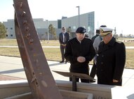 Army Gen. Charles H. Jacoby, Jr., commander of NORAD and U.S. Northern Command, and Adm. Mariano Saynez, Secretary of the Navy, Mexico, pause briefly at the NORAD and USNORTHCOM Sept. 11 Memorial during the admiral's visit to the commands Nov. 26, 2012. The commands flew the Mexican national flag in front of the headquarters building in honor of the admiral's close relationship with USNORTHCOM. The visit was Saynez's last as Secretary of the Navy, Mexico, before he steps down from his position Dec. 1. After speaking at a gathering of NORAD and USNORTHCOM members, honors were rendered in front the headquarters, where Jacoby presented Saynez with an engraved artillery casing and the Mexican flag flown in front of the building. Saynez's support of USNORTHCOM has been instrumental in the struggle against transnational criminal organizations. 

