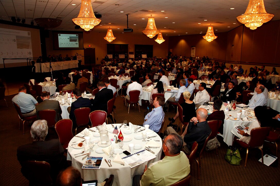 Sponsors, exhibitors and consultants listen to a panel speak about energy and sustainability during the “Camp Pendleton Day” event held at the Pacific Views event center here July 18. The Society of American Military Engineers holds the annual “Camp Pendleton Day” event every year in support of the war fighter, specifically the engineering industry. 