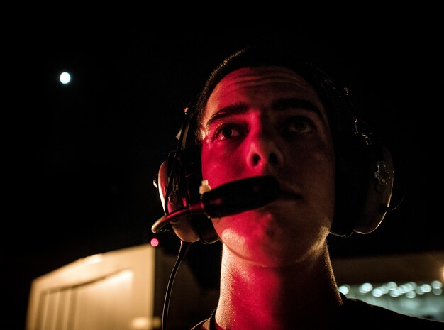 Senior Airman Mike Bowker, 437th Aircraft Maintenance Squadron crew chief, communicates with aircrew members inside the cockpit of a C-17 Globemaster III during pre-flight checks July 17, 2013, at Joint Base Charleston – Air Base, S.C. Airmen from the 437th Airlift Wing work around the clock on the flightline to provide combat-ready C-17A aircrews, mission support personnel and processes for 53assigned aircraft to meet White House, Department of State and Joint Chiefs of Staff-directed global deployment, employment and resupply of Department of Defense and allied forces via air land and airdrop operations. (U.S. Air Force photo/ Senior Airman Dennis Sloan)