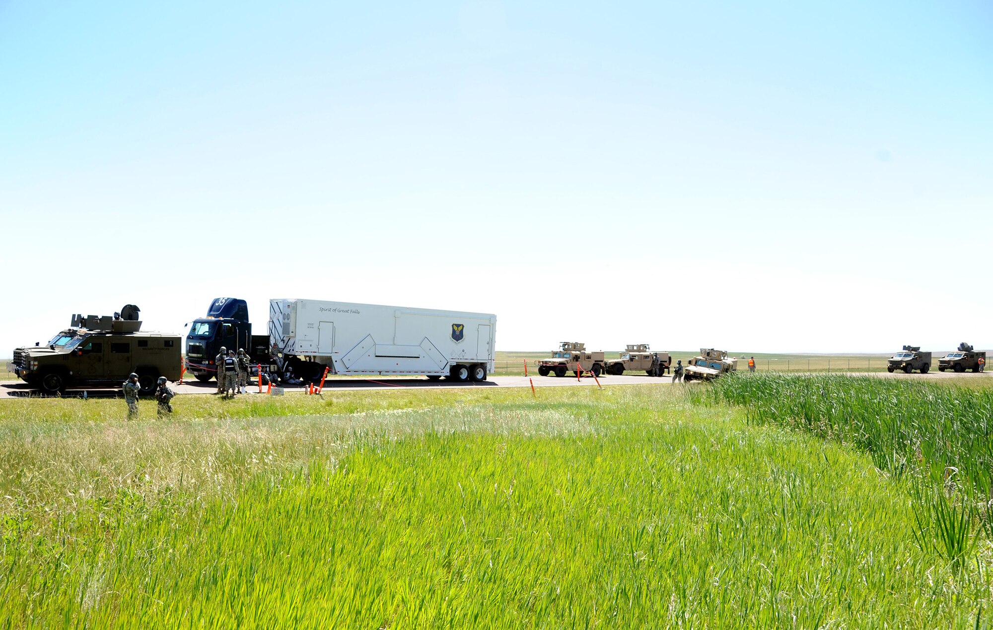 Malmstrom Air Force Base security forces members take part in an exercise incident July 10 on Perimeter Road. Exercises and inspections prepare individuals for real-world emergencies. (U.S. Air Force photo/Staff Sgt. R.J. Biermann)