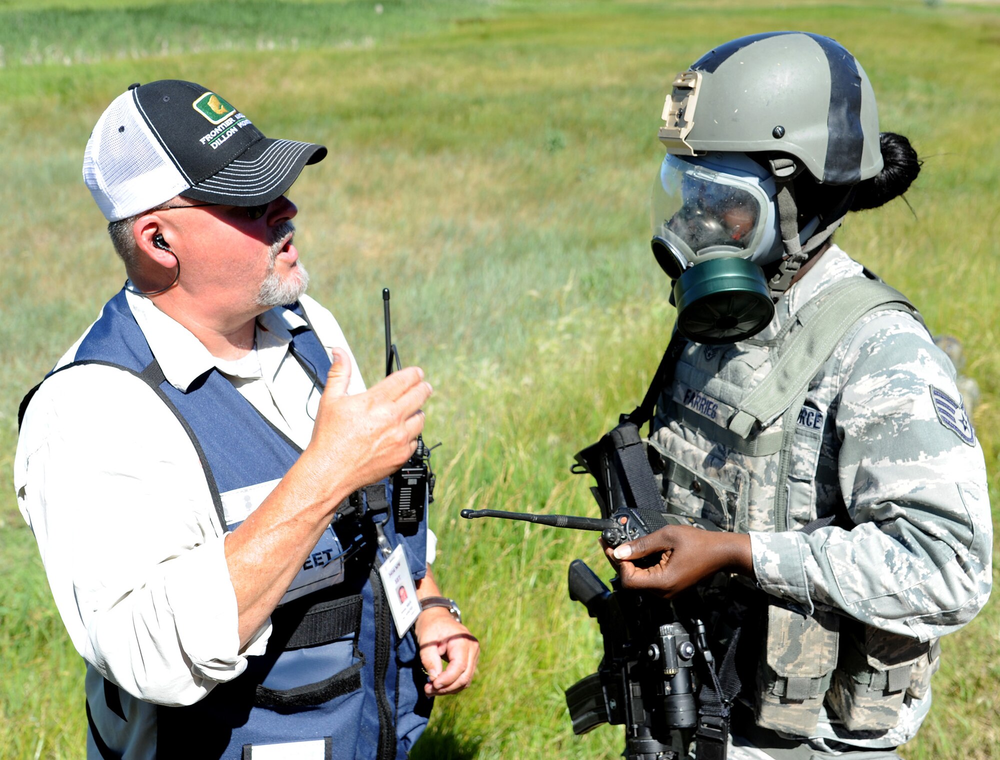 Mark Blake, 341st Missile Wing Exercise Evaluation Team chief, poses questions to Staff Sgt. Sydney Farries, 741st Missile Security Forces Squadron member. The wing inspection team hosts various exercises during the year to help prepare Team Malmstrom members for real-world emergencies. (U.S. Air Force photo/Staff Sgt. R.J. Biermann)