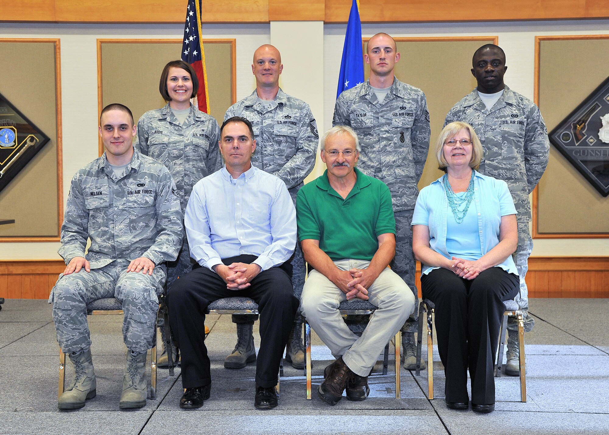 Winners of this quarter’s Wing Quarterly Awards pose for a photo at the Grizzly Bend on July 16.  Pictured from left to right are: (back row) Company Grade Officer of the Quarter, 1st Lt. Patricia Kodis, 341st Medical Group; Senior Noncommissioned Officer of the Quarter, Master Sgt. George Dollenger, 819th RED HORSE Squadron; Noncommissioned Officer of the Quarter, Staff Sgt. Dustin Taylor, 341st Security Forces Group; and Airman of the Quarter, Senior Airman Isaac Brenyah, 341st Mission Support Group.  (Front row) Honor Guard Member of the Quarter, Airman 1st Class Patrick Nelsen, 341st Munitions Squadron; Civilian Supervisor of the Quarter Category Two, Kevin King, 341st SFG; Civilian Non-Supervisor of the Quarter Category Two, Royce Shipley, 341st Mission Support Group; Civilian Supervisor of the Quarter Category One, Karen Pester, 341st MDG.  Not Pictured: Civilian Supervisory of the Quarter Category One, Jerry Loveless, 341st MSG.  The 341st MSG Emergency Management Section won Team of the Quarter, Dorm 768 won Outstanding Dormitory of the Quarter; and Airman 1st Class Micah Champers, 341st Missile Maintenance Squadron, won Outstanding Room of the Quarter. (U.S. Air Force photo/John Turner)