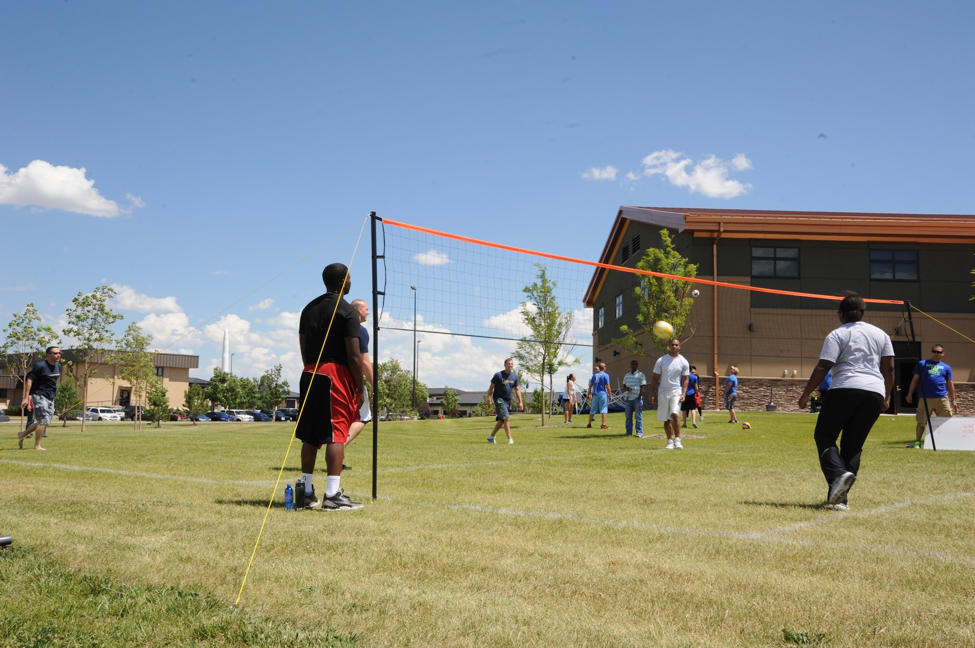 Members of the 341st Mission Support Group and 341st Security Forces Group compete in a volleyball game during Malmstrom’s quarterly Wing Sports Smackdown at the Grizzly Bend on July 12. The volleyball tournament brought more than seven teams together to contend for first place. (U.S. Air Force photo/Airman 1st Class Collin Schmidt) 

