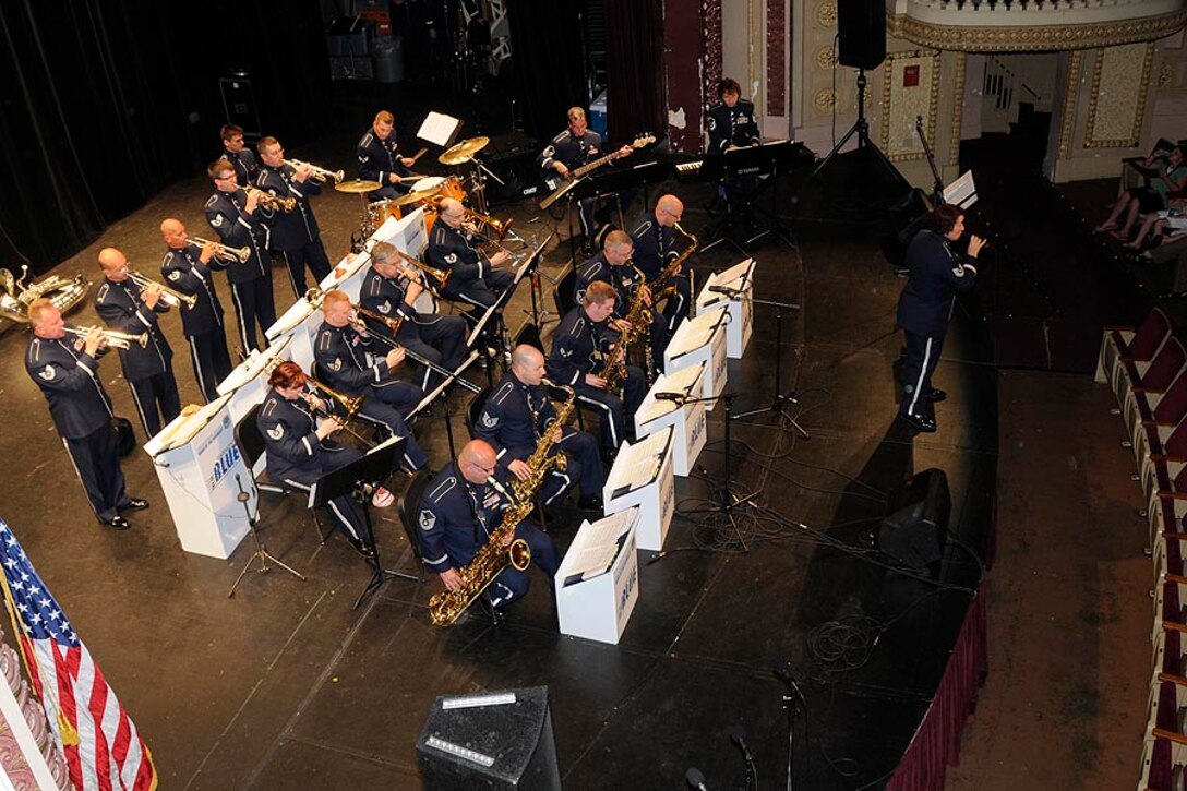 TSgt Peggy Miller sings with Harmony in Blue.

Photo courtesy of TSgt Todd Pendleton, 182nd AW Public Affairs