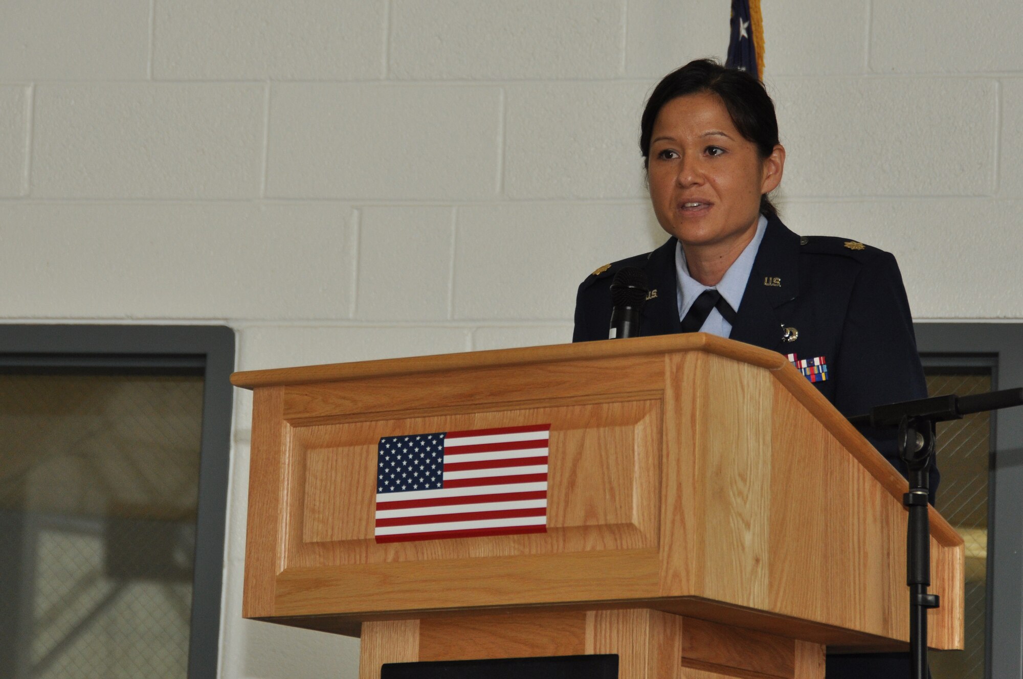 U.S. Air Force Maj. Cynthia Vernier, 459th Aircraft Maintenance Squadron commander, speaks to the audience after she assumed command in a change of command ceremony at Joint Base Andrews, Md., July 13, 2013. Vernier was previously the 44th Maintenance Squadron commander, Holloman Air Force Base, N.M., before arriving at the 459 AMXS as a maintenance officer in April of 2013. (U.S. Air Force photo by Staff Sgt. Brent A. Skeen)