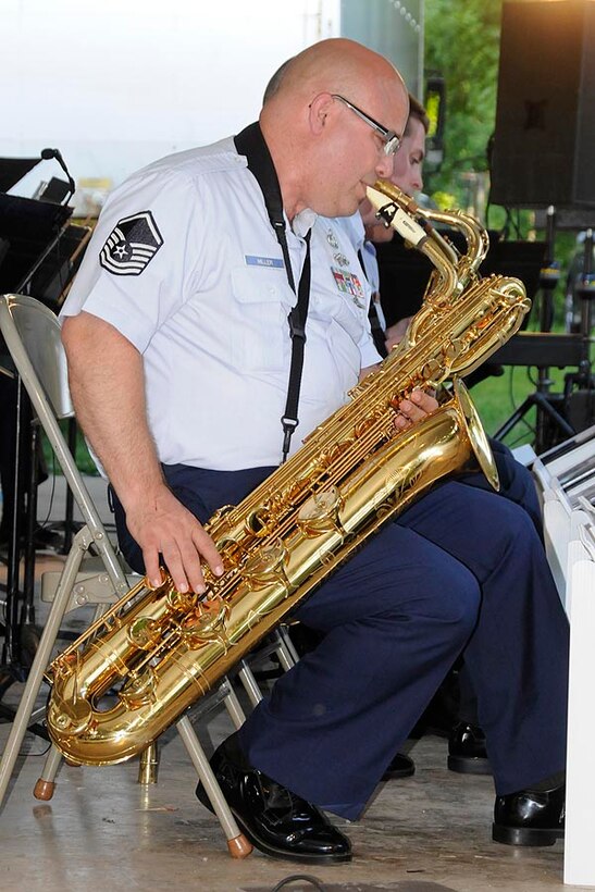 MSgt Jesse Miller plays bari sax with Harmony in Blue.

Photo courtesy of TSgt Todd Pendleton, 182nd AW Public Affairs