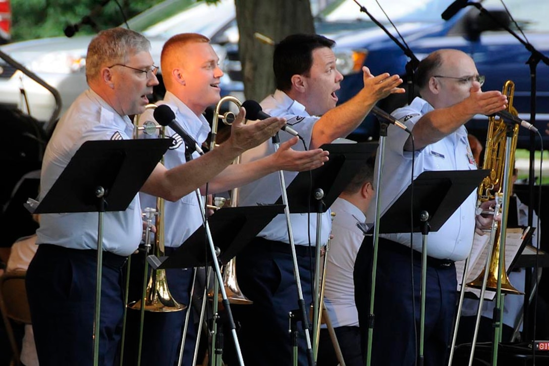 The trombones add a touch of barbershop by singing accapella for a short passage in "76 Trombones".

Photo courtesy of TSgt Todd Pendleton, 182nd AW Public Affairs