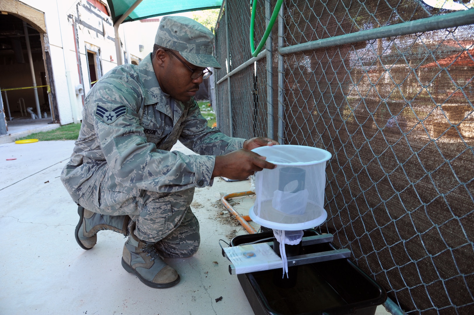 Senior Airman Shannon Anderson, 359th Aerospace Medicine Squadron public health technician, collects mosquitoes July 11 at the Joint Base San Antonio-Randolph Child Development Center. Once collected, the mosquitoes are tested for West Nile virus. (U.S. Air Force photo by Rich McFadden/released)
Senior Airman Shannon Anderson, 359th Aerospace Medicine Squadron public
health technician, collects mosquitoes July 11 at the Joint Base San
Antonio-Randolph Child Development Center. Once collected, the mosquitoes
are tested for West Nile virus. (U.S. Air Force photo by Rich
Senior Airman Shannon Anderson, 359th Aerospace Medicine Squadron public
health technician, collects mosquitoes July 11 at the Joint Base San
Antonio-Randolph Child Development Center. Once collected, the mosquitoes
are tested for West Nile virus. (U.S. Air Force photo by Rich
McFadden/released)

